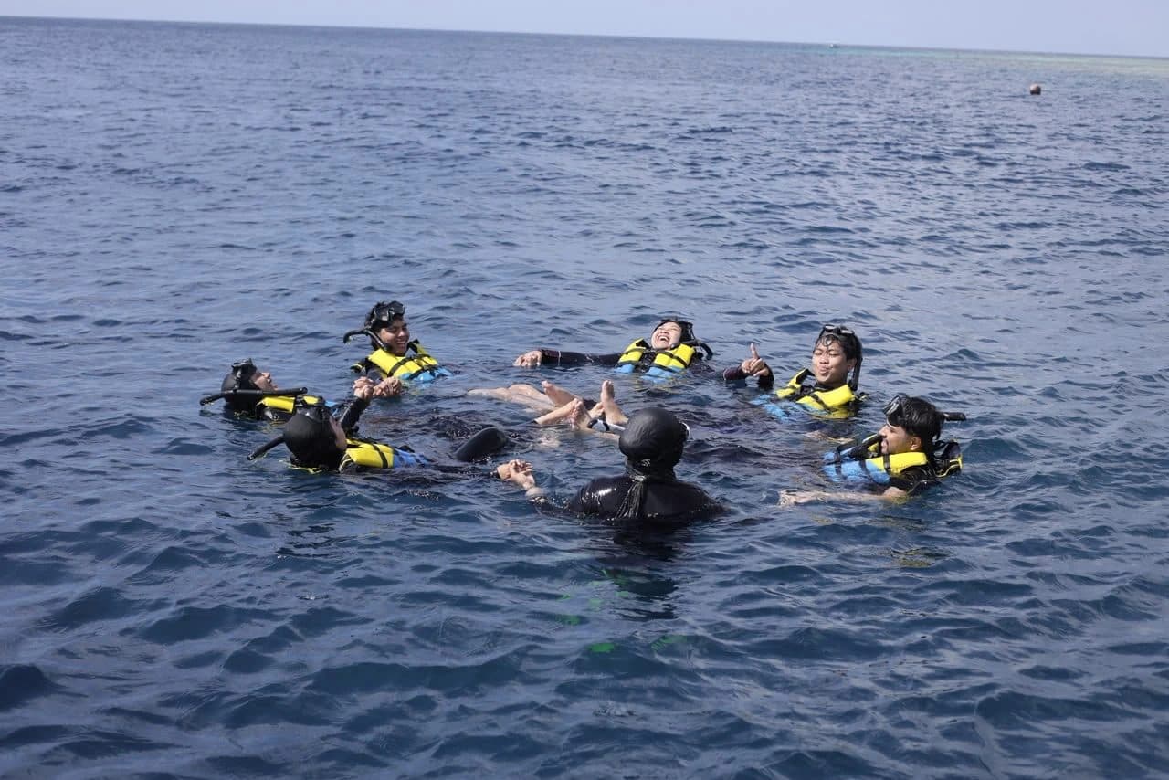 Guests snorkeling together at Menjangan Island