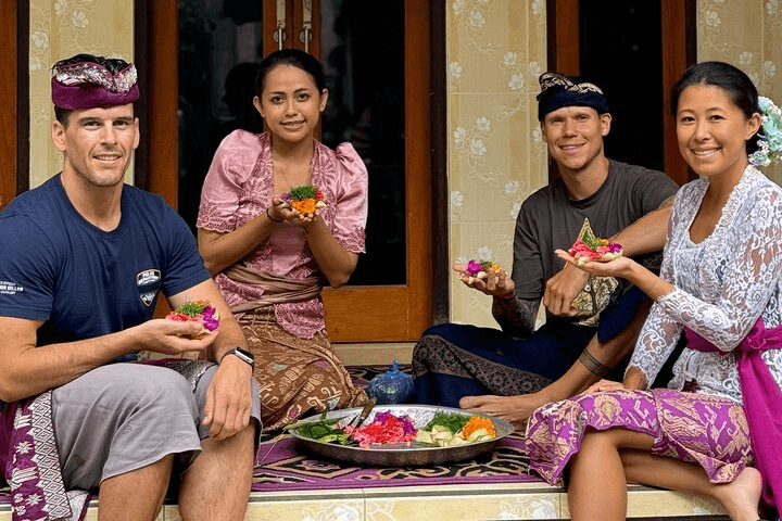 Guests making flower offerings with a host